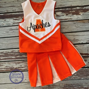 orange & black cheer uniform, customized cheerleading uniform, girls cheer uniform, orange and white cheer uniform, trojan cheer uniform