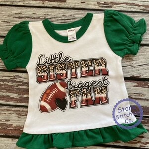 thumbnail image 2 of Little Sister Biggest Fan Football Shirt - Toddler Cheerleader Tee 2 of 13