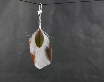 Simple earrings with natural feathers