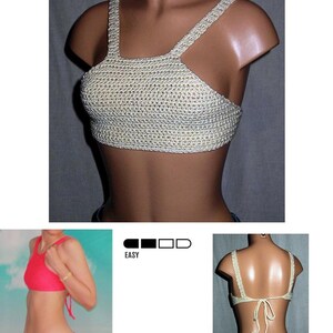 May include: A crochet pattern for a halter top, titled "112 Fitness Halter Top Pattern." The image shows a light beige halter top with a square neckline and straps. The pattern is marked "EASY" and includes instructions for different sizes.