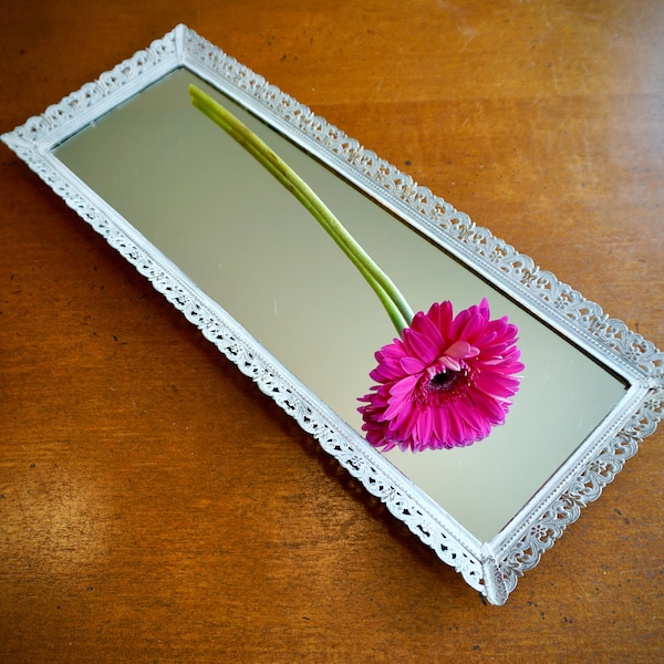 Vintage Vanity Mirror, Long and narrow metal frame painted pale pink to hang or lay flat, 19.5 inch long and narrow vanity mirror