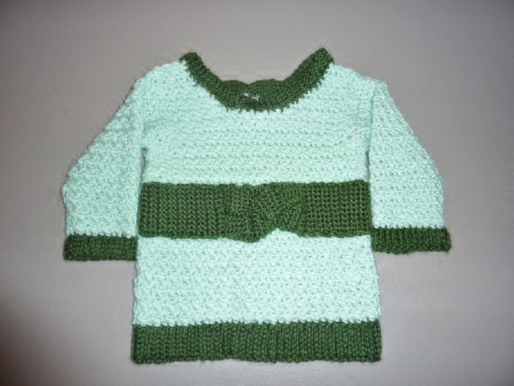 light green sweater