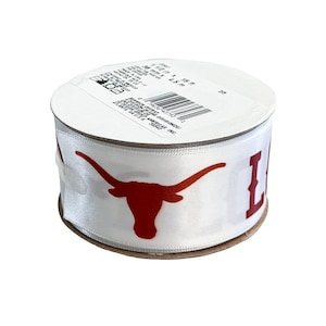 May include: White satin ribbon with a red and white Longhorn logo and the word "Longhorns" printed in red. The ribbon is 2.5 inches wide and 10 yards long.