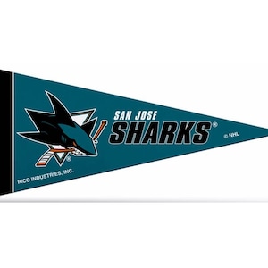 May include: A teal blue pennant with a black shark logo and the text "San Jose Sharks" in black. The pennant has a black border and the text "NHL" in white.