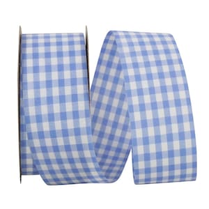 May include: A spool of fabric ribbon featuring a classic light blue and white gingham check pattern. The ribbon is wound around a central cardboard core, displaying a consistent repeating square grid design across the entire visible length of the material.