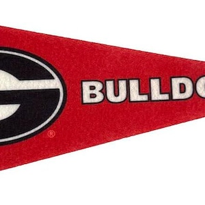 May include: A red pennant with a black stripe on the left side. The pennant features a white "G" inside a black oval, with the word "BULLDOGS" in white letters to the right. The pennant is a triangular shape.