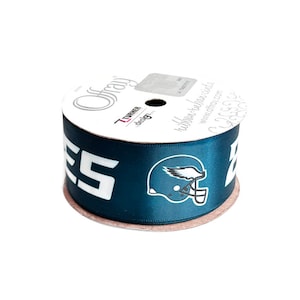 Könnte beinhalten: Eine Spule mit tealblauem Satinband mit einem weißen Footballhelm und dem aufgedruckten Wort "EAGLES".