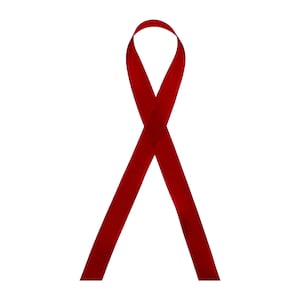 Peut inclure: Un ruban rouge noué en boucle, symbole de sensibilisation et de soutien.