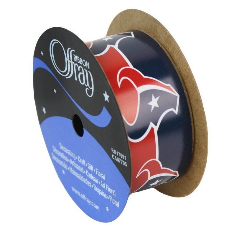 May include: A roll of blue, red, and white ribbon with a star and a football team logo. The ribbon is labeled "Ofray Ribbon" and has the company's website address printed on the label.
