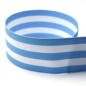 May include: Blue and white striped ribbon. The ribbon is made of a soft, woven fabric and has a subtle sheen.