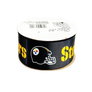 May include: Black satin ribbon with a yellow "Steelers" logo and a black and yellow football helmet graphic. The ribbon is 1.5 inches wide and 10 yards long.