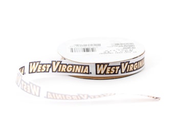 May include: A roll of white ribbon with the words "West Virginia" printed in gold and black letters.