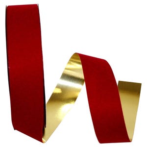 May include: A double-sided ribbon featuring a deep red velvet texture on one side and a smooth, reflective metallic gold finish on the reverse. The ribbon is displayed in a loose, flowing S-curve shape, showcasing both the matte red and gold sides.