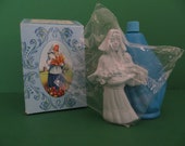 Avon Bottle Dutch Girl with Box and top is sealed in original plastic bag from 1973