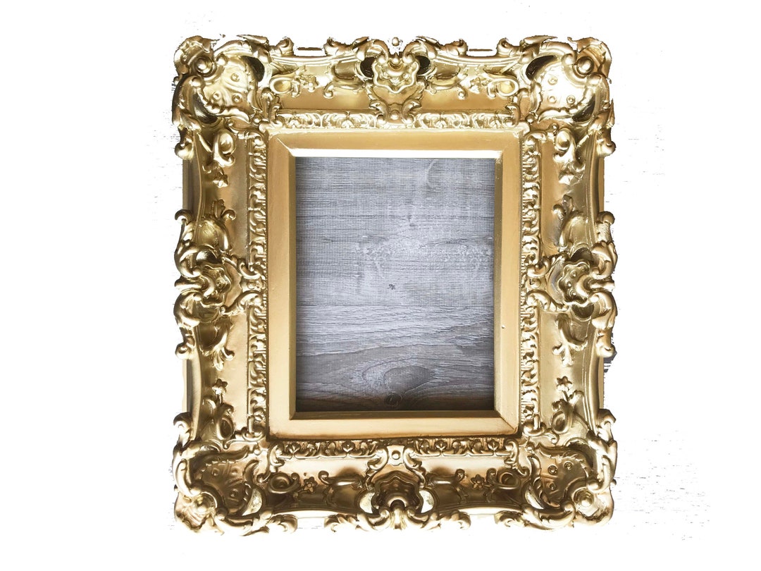 Gold painting frame discount