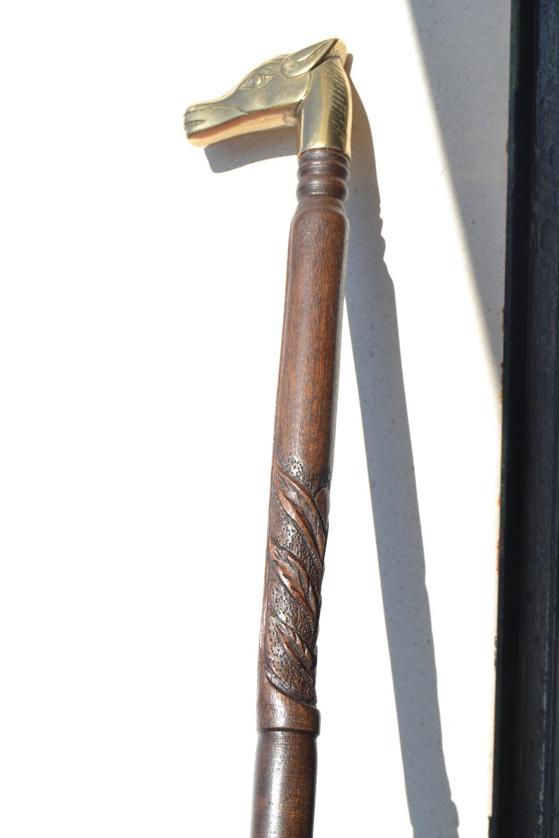 Antique Carved Wooden Cane And Bronze Grip