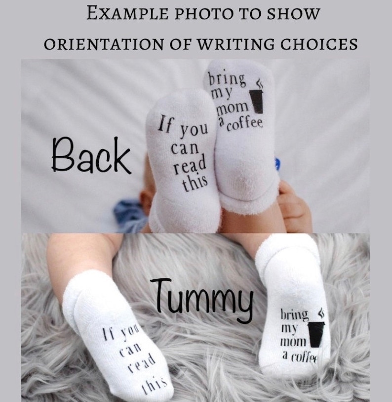 May include: A pair of white baby socks with black text that reads "If you can read this bring my mom a coffee". The socks are shown on a baby's feet in two different positions, one with the text facing the camera and the other with the text facing away from the camera.