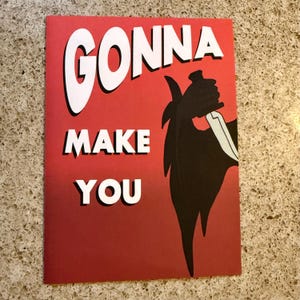 May include: Red poster with the words "GONNA MAKE YOU" in white, outlined in black. A black silhouette of a figure holding a knife is on the right side of the poster. The background is a solid red.