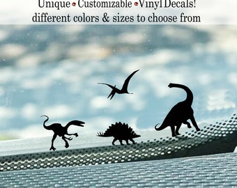 May include: Silhouettes of four dinosaurs on a blue background. The dinosaurs are a pterodactyl, a stegosaurus, a brachiosaurus, and a velociraptor. The image is for a vinyl decal.