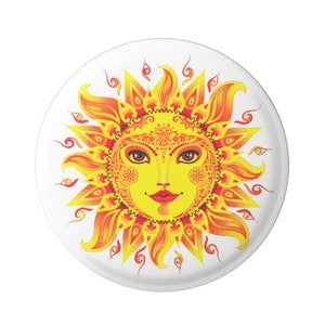 May include: A stylized illustration of a sun with a human face. The sun is yellow with orange and red rays. The face has brown eyes, a red mouth, and a yellow complexion. The sun is surrounded by a white background.