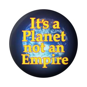May include: A blue and white button with the text "It's a Planet not an Empire" in yellow letters.