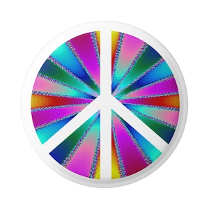 May include: A white peace sign with a colorful, rainbow-like design radiating from the center. The design features shades of blue, green, pink, red, and yellow.