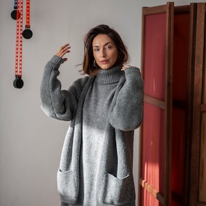 Oversized winter dress layered with a matching merino wool cardigan.