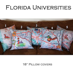 May include: Five 18-inch pillow covers featuring maps of Florida universities. The pillow covers are white with colorful maps and illustrations of each university.