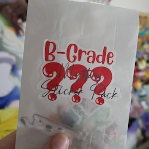 B- grade mystery laminated sticker pack