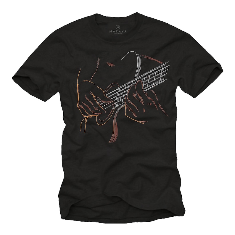 May include: Black t-shirt featuring a line drawing of a person playing a guitar. The illustration is in shades of orange and white, with the guitar strings and fretboard clearly visible. The brand name "MAKAYA" is printed at the top.