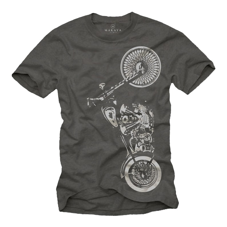 以下が含まれることがあります： 詳細な白いバイクのグラフィックが特徴の濃い灰色のTシャツ。デザインには、バイクのホイール、エンジン、フレームが含まれています。「MAKAYA」というブランド名がシャツの上部に印刷されています。