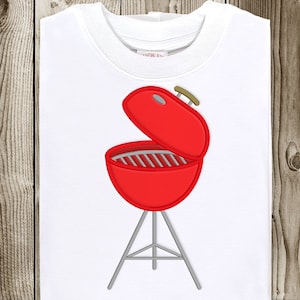May include: Red metal grill with a lid open and a handle. The grill is on a tripod stand.