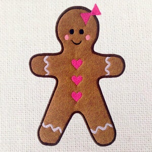 Conception de broderie d’applique de fille de pain d’épice