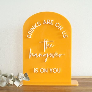 acrylic drinks are on us hangover bar sign | acrylic wedding sign | wedding decor | signature drinks | reception | bar table | bar | alcohol