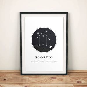 May include: Black and white printable art print with a constellation design for the zodiac sign Scorpio. The print features a black circle with white stars and the constellation design for Scorpio. The text "Scorpio" is printed below the circle in black text. The text "Passionate | Observant | Dynamic" is printed below the word "Scorpio" in smaller black text.