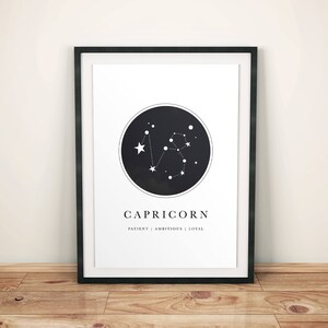 May include: Black and white printable art print featuring the Capricorn constellation with the text "Capricorn" and "Patient | Ambitious | Loyal".