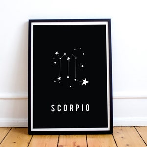 May include: Black and white print of the Scorpio constellation with the word "SCORPIO" printed below.