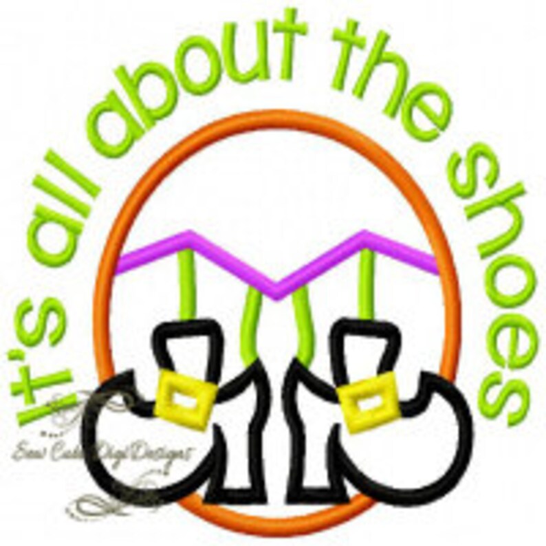 May include: It's all about the shoes embroidery design with a circle of orange thread, a pair of black shoes with gold buckles, and green and purple thread accents.