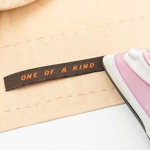 Etichette termoadesive tessute sostenibili - Confezione da 50 etichette personalizzate per abbigliamento