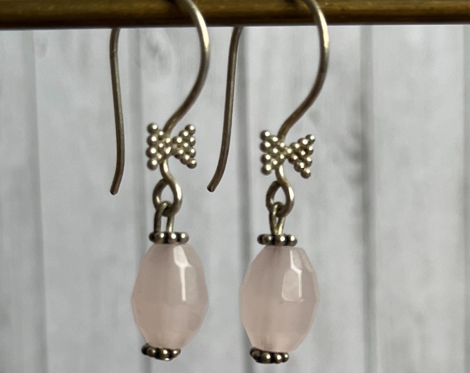 Silver plated earrings with bow accents and rose quartz pendants