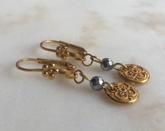 Gold plated earrings with hematite beads and mandala charms