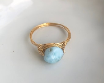 Gold filled ring with light blue larimar