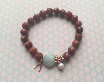 Bracelet with goldstone and amazonite beads and rose gold plated details