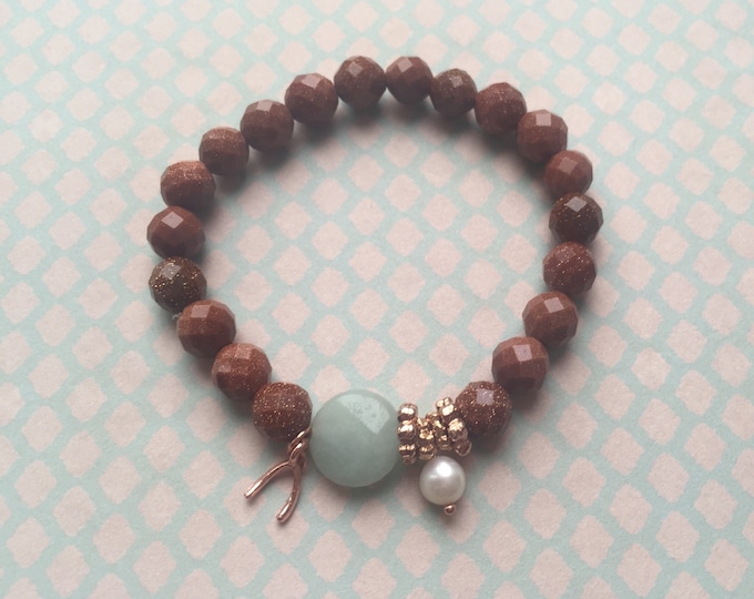 Bracelet with goldstone and amazonite beads and rose gold plated details