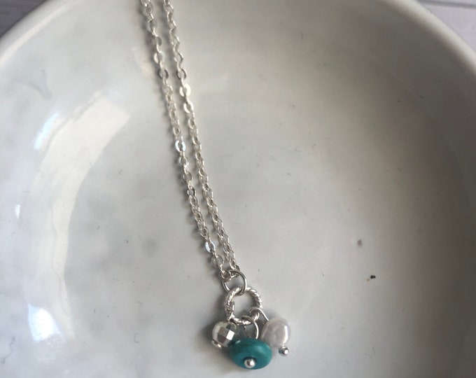 Sterling silver necklace with small freshwater pearl and turquoise bead