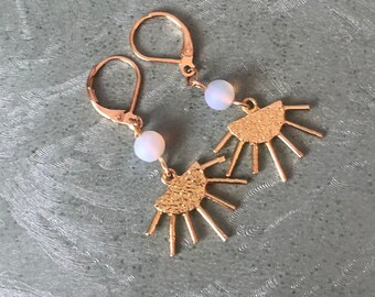 Gold plated earrings with frosted opalite beads and sunbeam charms