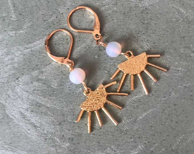 Gold plated earrings with frosted opalite beads and sunbeam charms