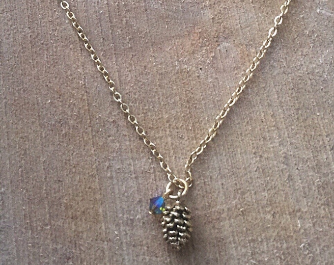 Gold plated necklace with pinecone charm and Swarovski bead