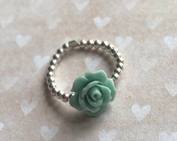 Sterling silver ring with coral rose