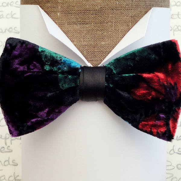 Rich print crushed velvet, pre tied bow tie on an adjustable black satin band.
